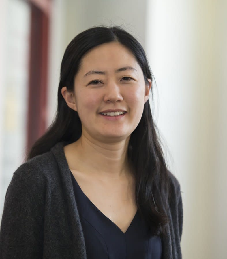 <span class="icon icon--xs icon__camera">  </span> <span class="credit font--s-m upper black"> <b>Temple University</b> </span> <div class="caption space-half--right font--s-m gray--med db">Jennifer Lee, an assistant clinical professor of law at Temple University, works with students to represent people in cases affecting low-income individuals in the region.</div>