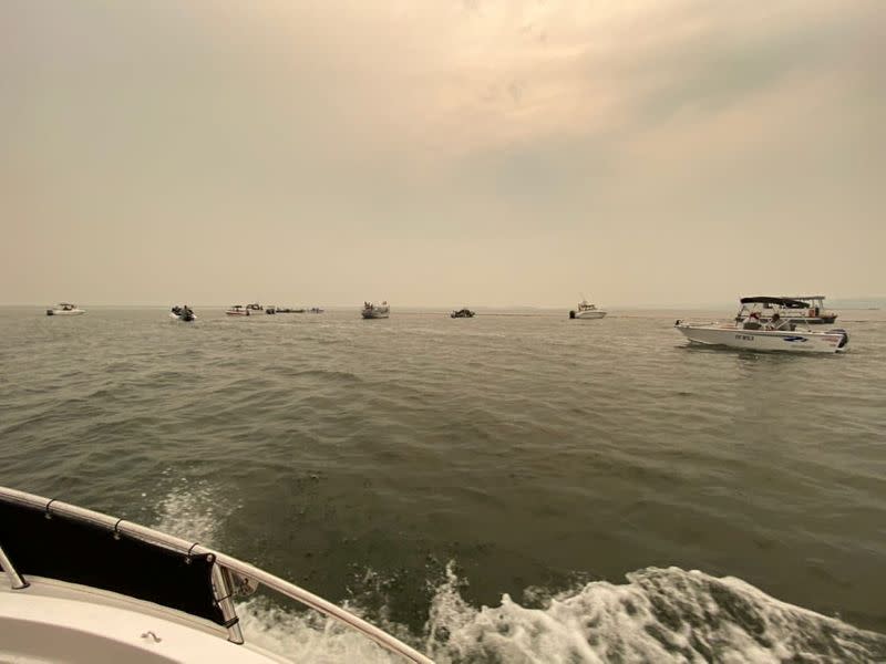 A view shows a smokey sky due to wild bushfires in Mallacoota