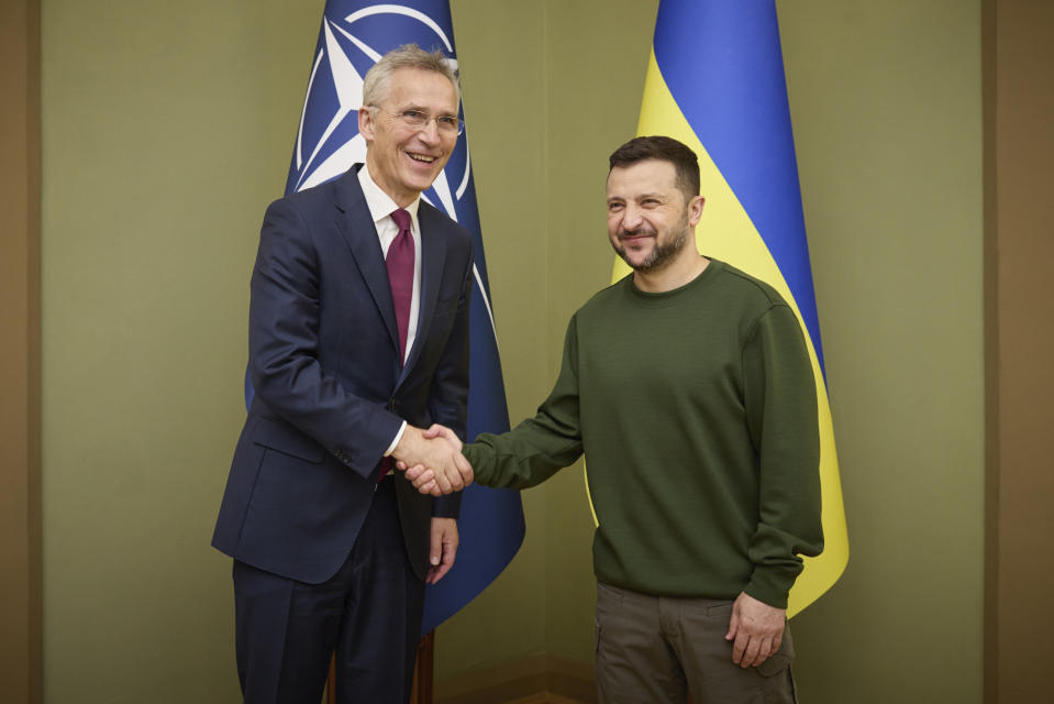 Ukrainian President Volodymyr Zelenskyy, right, welcomes NATO Secretary General Jens Stoltenberg during their meeting in Kyiv, Ukraine, Monday, April 29, 2024. (Ukrainian Presidential Press Office via AP)