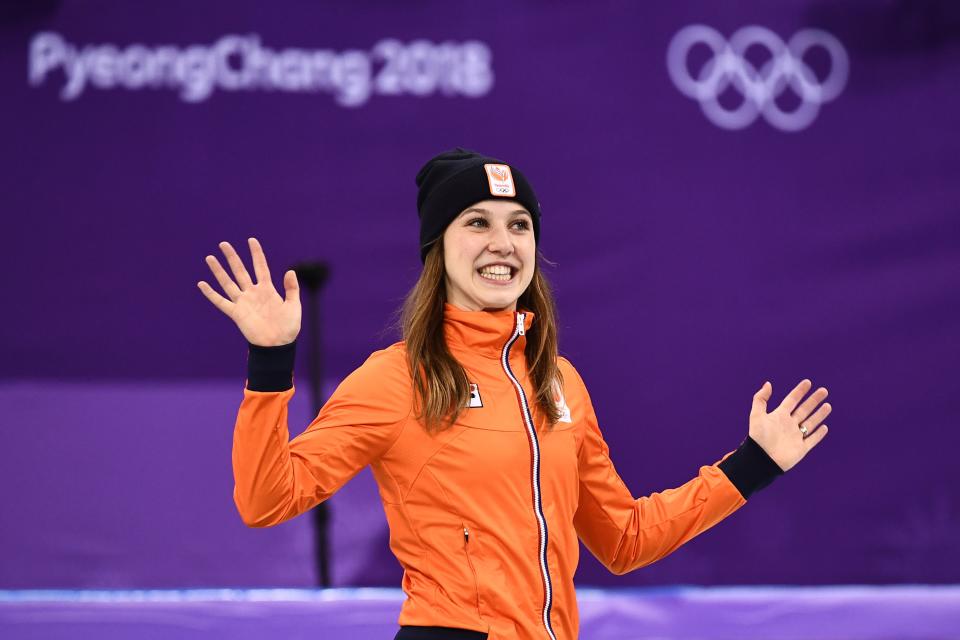 <p>Netherlands’ Suzanne Schulting celebrates her gold win at the podium in the women’s 1,000m short track speed skating venue ceremony during the Pyeongchang 2018 Winter Olympic Games, at the Gangneung Ice Arena in Gangneung on February 22, 2018. / AFP PHOTO / ARIS MESSINIS (Photo credit should read ARIS MESSINIS/AFP/Getty Images) </p>