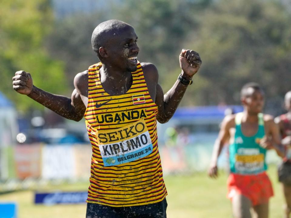 Jacob Kiplimo of Uganda celebrates after wins the men's senior race (AP)