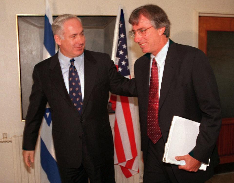 In this file photo, Israeli Prime MInister Benjamin Netanyahu, left, welcomes U.S peace mediator Dennis Ross upon his arrival at the Prime Minister's office in Jerusalem, Sunday Aug. 10, 1997.