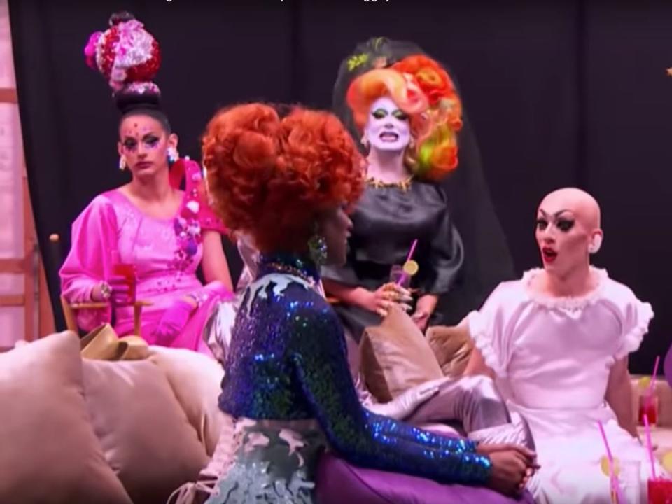 cast of drag queens sitting on couches on set of 'ru paul's drag race'