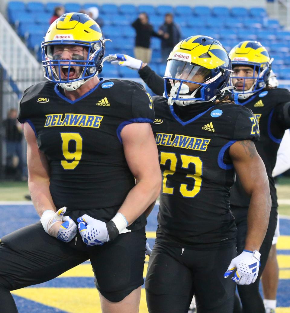 Delaware tight end Braden Brose reacts after he scored on a touchdown reception in the fourth quarter of the Blue Hens' 36-34 win in the opening round of the NCAA FCS playoffs Saturday, Nov. 25, 2023 at Delaware Stadium. Delaware running back Quincy Watson joins the celebration at right.