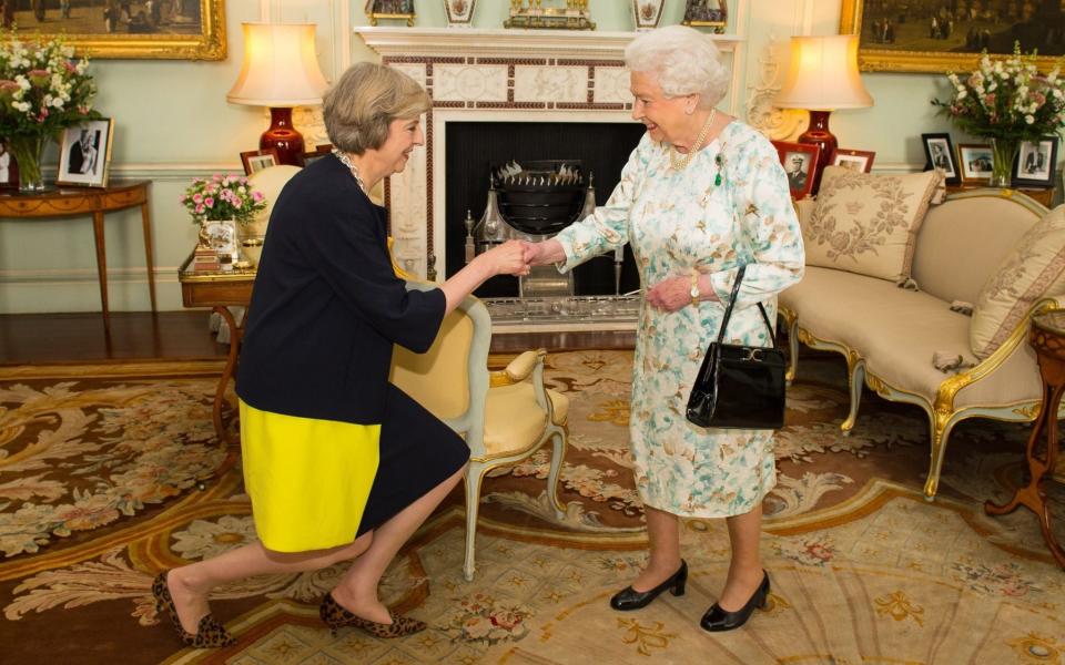 Theresa May, pictured meeting the late Queen for the first time as prime minister in 2016, said the monarch was 'respected around the world' - Dominic Lipinski/PA wire