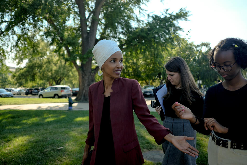 Omar on Capitol Hill with a staffer (center) and her daughter, Isra Hirsi (right), on July 15, 2019. | Gabriella Demczuk for TIME