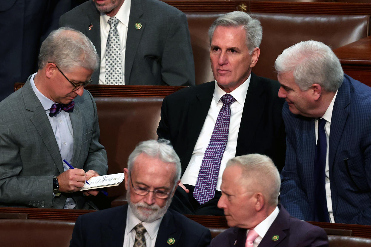 WASHINGTON, DC - JANUARY 04: (L-R) Rep.-elect Patrick McHenry (R-NC), House Republican Leader Kevin McCarthy (R-CA) and Rep.-elect Tom Emmer (R-MN) talk during the second day of elections for Speaker of the House at the U.S. Capitol Building on January 04, 2023 in Washington, DC. The House of Representatives is meeting to vote for the next Speaker after House Republican Leader Kevin McCarthy (R-CA) failed to earn more than 218 votes on three separate Tuesday ballots, the first time in 100 years that the Speaker was not elected on the first ballot. (Photo by Win McNamee/Getty Images)