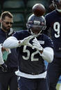 Chicago Bears' outside linebacker Khalil Mack, 52, takes part in an NFL training session at the Allianz Park stadium in London, Friday, Oct. 4, 2019. The Chicago Bears are preparing for an NFL regular season game against the Oakland Raiders in London on Sunday. (AP Photo/Matt Dunham)