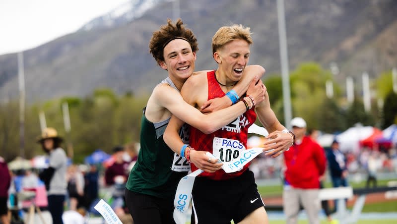 Olympus’ JoJo Jourdon hugs American Fork’s Daniel Simmons during the BYU Track Invitational at the Clarence F. Robison Outdoor Track & Field in Provo on May 6, 2023.