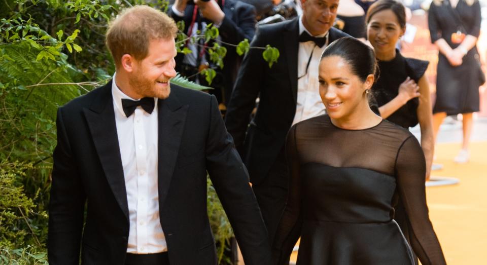 Meghan Markle and Prince Harry have reportedly been breaking etiquette by insisting on sitting next to each other at dinner parties [Image: Getty]