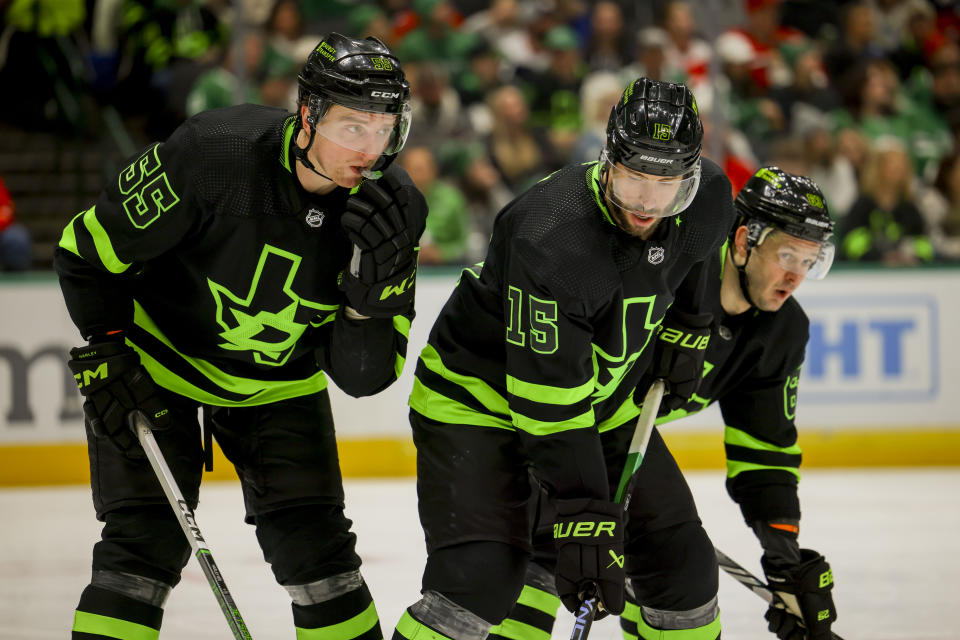 Dallas Stars players Thomas Harley (55), Craig Smith (15) and Evgenii Dadonov (63) line up during the second period of an NHL hockey game against the Washington Capitals, Saturday, Jan. 27, 2024, in Dallas. (AP Photo/Gareth Patterson)