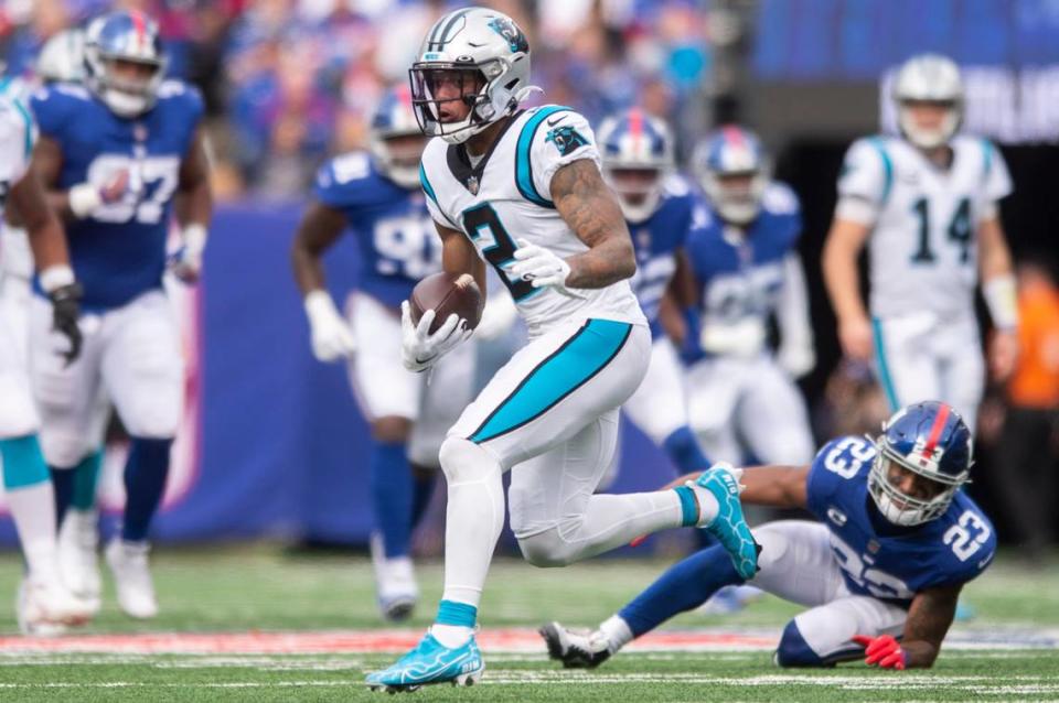 Panthers wide receiver DJ Moore escapes Giants defense as he runs the ball during the game at MetLife Stadium on Sunday, October 24, 2021 in Rutherford, NJ.