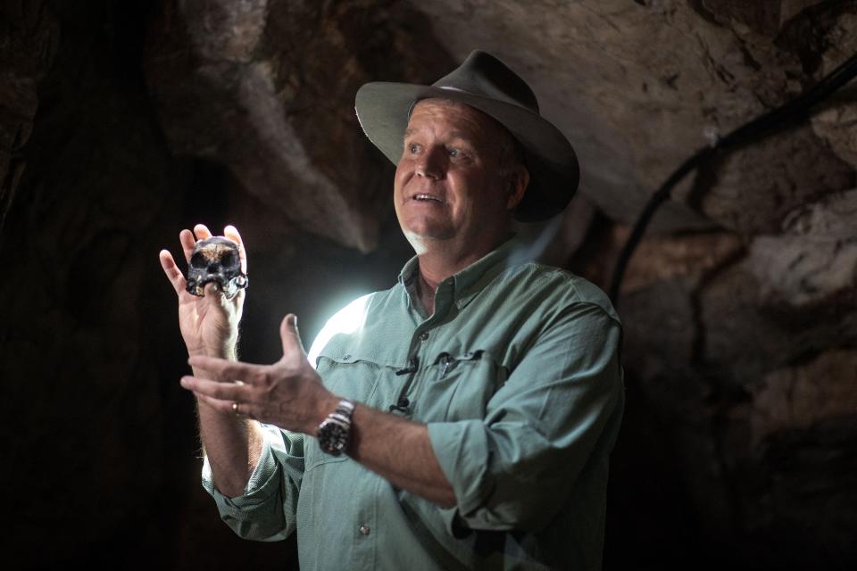 Professor Lee Berger shows a reproduction of the skull of a Homo naledi named Leti, found inside the Rising Star Cave System at the Cradle of Humankind World Heritage Site near Maropeng, South Africa on November 4, 2021.