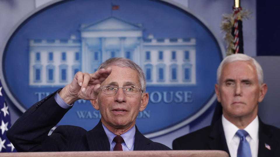 Dr. Anthony Fauci, director of the National Institute of Allergy and Infectious Diseases, speaks about the coronavirus in the James Brady Press Briefing Room of the White House, Tuesday, March 31, 2020, in Washington, as Vice President Mike Pence listens. (AP Photo/Alex Brandon)