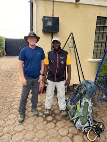 David Hill and Salim, his guide, in Tanzania, Africa where they climbed Mount Kilimanjaro early December 2021.