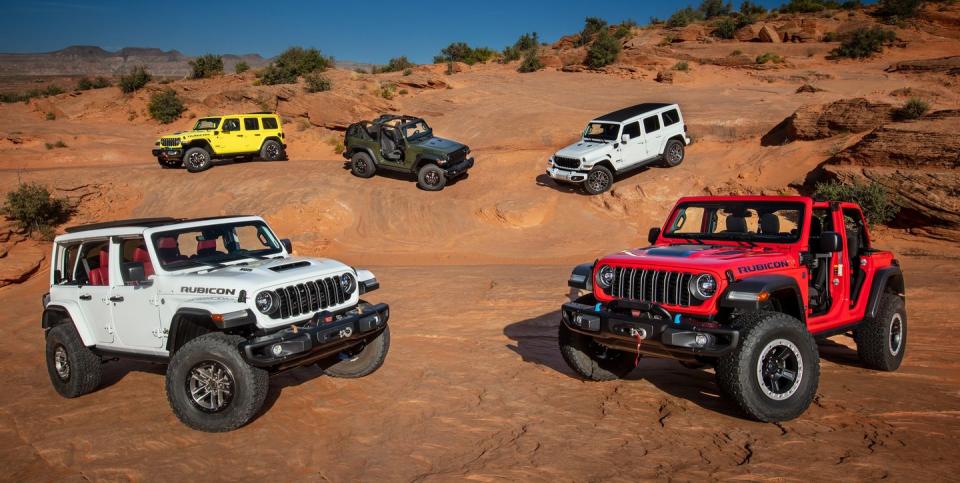 2024 jeep® wrangler lineup clockwise from bottom wrangler rubicon 392, wrangler rubicon x 4xe, wrangler willys 2 door, wrangler high altitude 4xe and wrangler rubicon 4xe with jpp 2 inch lift kit