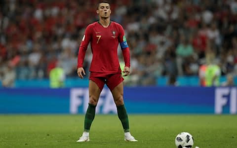 Fisht Stadium, Sochi, Russia - June 15, 2018 Portugal's Cristiano Ronaldo lines up before scoring their third goal from a free kick  - Credit: REUTERS/Ueslei Marcelino