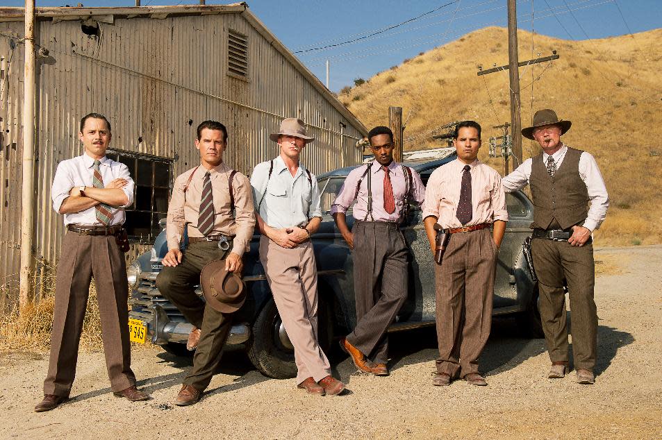 This film image released by Warner Bros. Pictures shows, from left, Giovanni Ribisi as Officer Conwell Keeler, Josh Brolin, as Sgt. John O'Mara, Ryan Gosling as Sgt. Jerry Wooters, Anthony Mackie as Officer Coleman Harris, Michael Pena as Officer Navidad Ramirez and Robert Patrick as Officer Max Kennard in “Gangster Squad." (AP Photo/Warner Bros. Pictures, Wilson Webb)