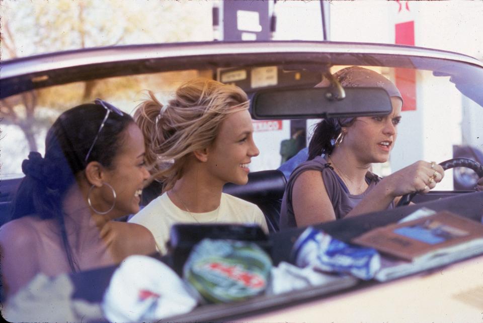 Zoe Saldaña as Kit, from left, Britney Spears as Lucy and Taryn Manning as Mimi appear in a scene from the 2002 film "Crossroads."