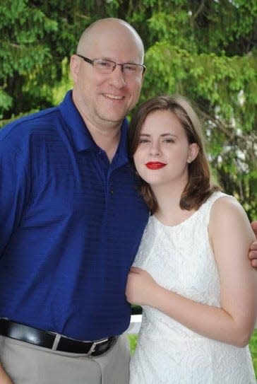 Cassie Pearson of Taunton was 22 when she died from lymphoma in October 2020.  Her family started the Cassie Pearson Memorial Scholarship in her honor. This photo is of Cassie with her father, Eric Pearson.