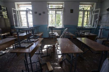 A view of a classroom of school No.57 damaged by recent shelling in Donetsk, eastern Ukraine, October 1, 2014. REUTERS/Shamil Zhumatov