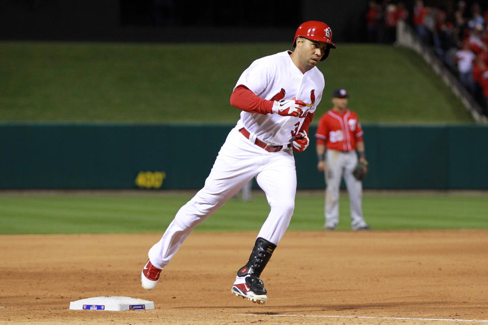 Carlos Beltran #3 of the St. Louis Cardinals rounds the bases after hitting a two-run home run in the eighth inning against the Washington Nationals during Game Two of the National League Division Series at Busch Stadium on October 8, 2012 in St Louis, Missouri. (Photo by Dilip Vishwanat/Getty Images)