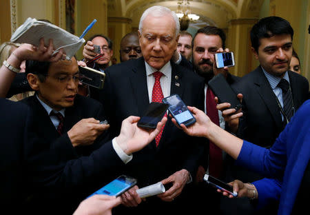 Senator Orrin Hatch speaks to reporters after meeting with U.S. Secretary of the Treasury Steven Mnuchin and Director of the National Economic Council Gary Cohn and Republican law makers about tax reform on Capitol Hill in Washington, U.S., September 12, 2017. REUTERS/Joshua Roberts