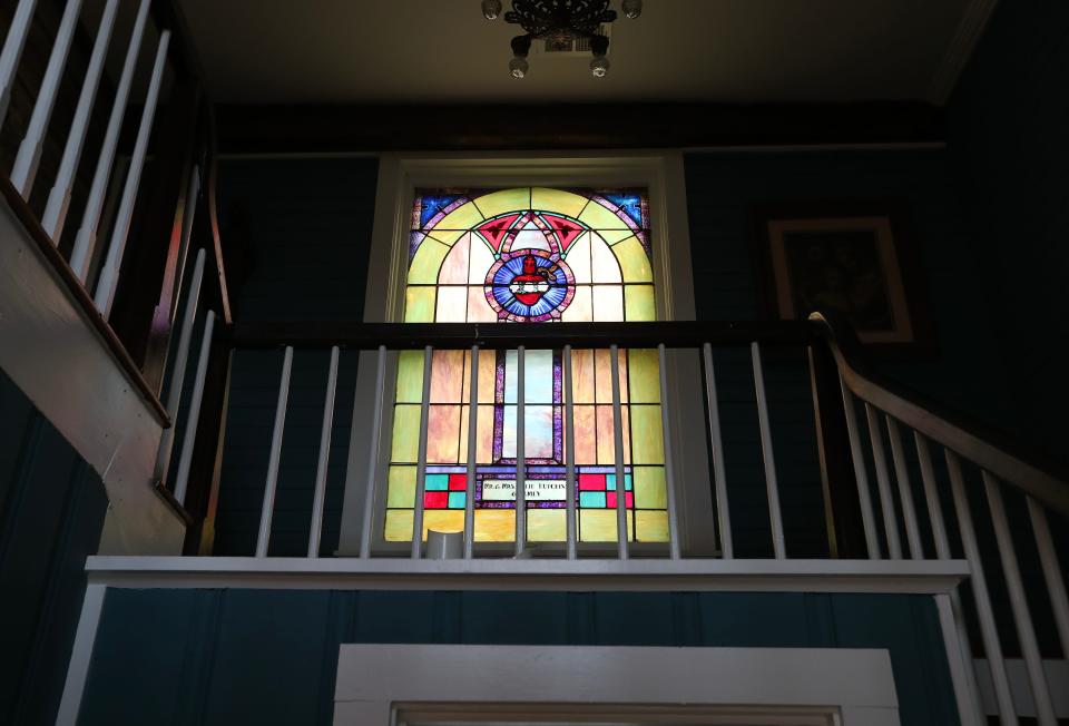 The Hutchins siblings were able to reclaim a stained glass window their grandfather donated to the former St. Mark's Church and had it installed inside their family home built in 1780 in Bardstown, Ky. on Oct. 24, 2023.