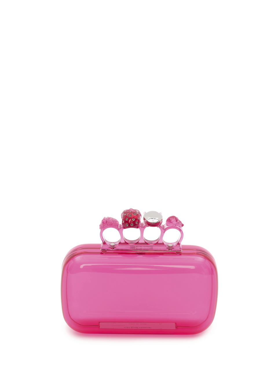 This photo shows the Alexander McQueen Skull Four Ring Clutch in pink. Barbiecore is driving a desire for all things pink this holiday season. (Alexander McQueen via AP