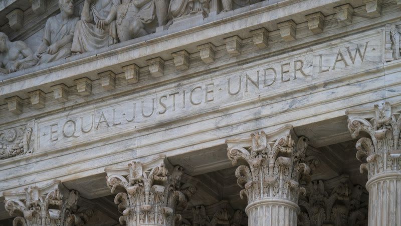 In this March 20, 2019, file photo, the west facade of the Supreme Court Building bears the motto “Equal Justice Under Law,” in Washington.