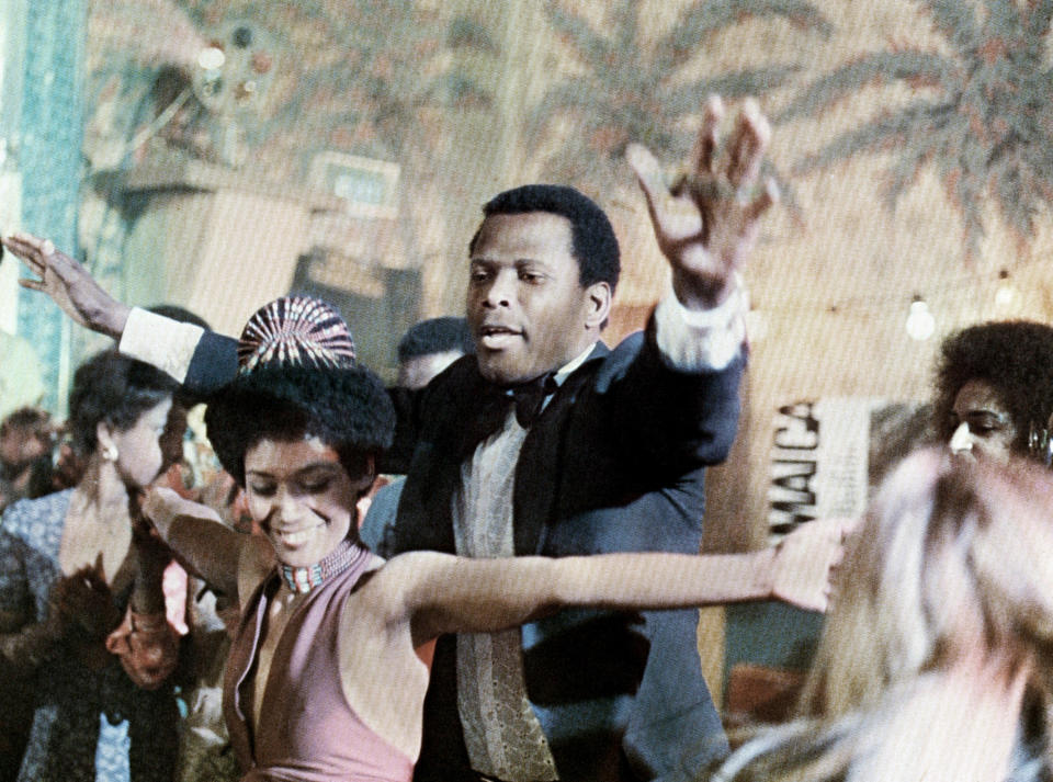 Sidney Poitier and Esther Anderson in "A Warm December"