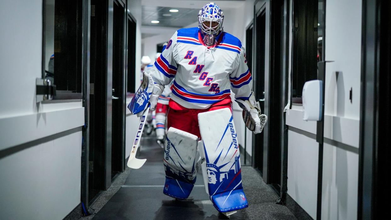 TORONTO, ONTARIO - AUGUST 03: Henrik Lundqvist #30 of the New York Rangers heads to the dressing room before facing the Carolina Hurricanes in Game Two of the Eastern Conference Qualification Round prior to the 2020 NHL Stanley Cup Playoffs at Scotiabank Arena on August 03, 2020 in Toronto, Ontario. (Photo by Mark Blinch/NHLI via Getty Images)