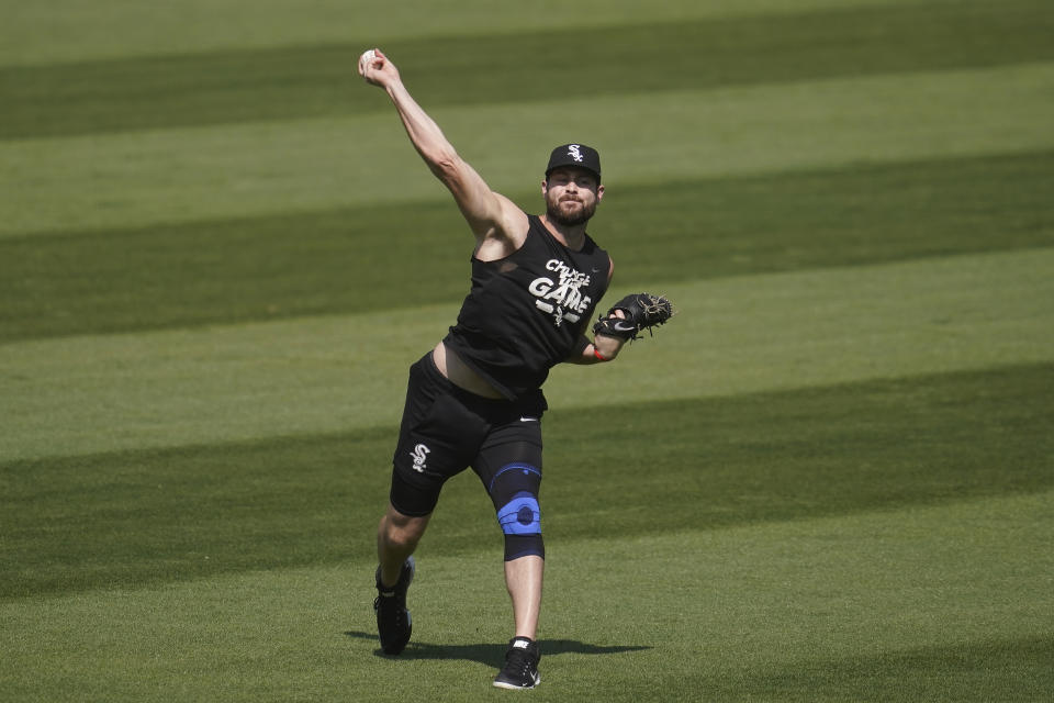 Chicago White Sox pitcher Lucas Giolito throws at practice during a baseball workout in Oakland, Calif., Monday, Sept. 28, 2020. The White Sox are scheduled to play the Oakland Athletics in an American League wild-card playoff series starting Tuesday. (AP Photo/Jeff Chiu)
