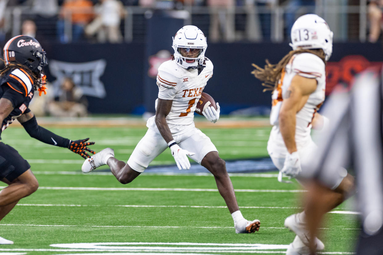 ARLINGTON, TX - DECEMBER 02: Texas Longhorns wide receiver Xavier Worthy (#1) runs up field after a catch during the Big 12 Championship football game between the Texas Longhorns and Oklahoma State Cowboys on December 02, 2023 at AT&T Studium in Arlington, Texas. (Photo by Matthew Visinsky/Icon Sportswire via Getty Images)