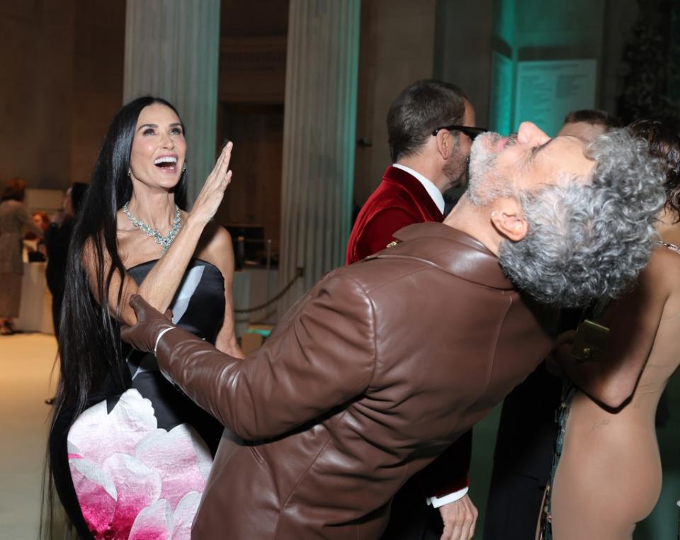 Oh, to be a fly on the wall to hear whatever Demi Moore and Taika Waititi laughed at. Getty Images for The Met Museum/Vogue