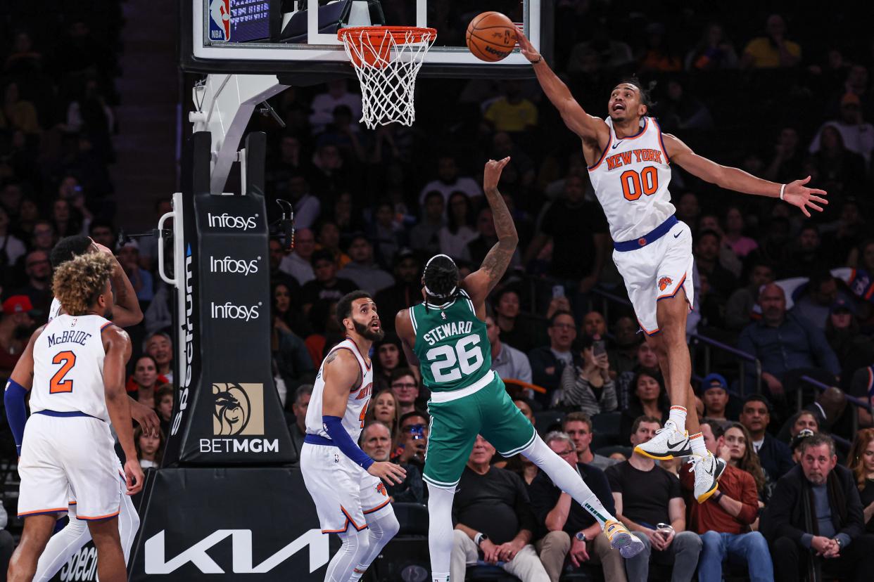 Oct 9, 2023; New York, New York, USA; New York Knicks forward Jacob Toppin (00) blocks a shot by Boston Celtics guard DJ Steward (26) during the second half at Madison Square Garden. Mandatory Credit: Vincent Carchietta-USA TODAY Sports