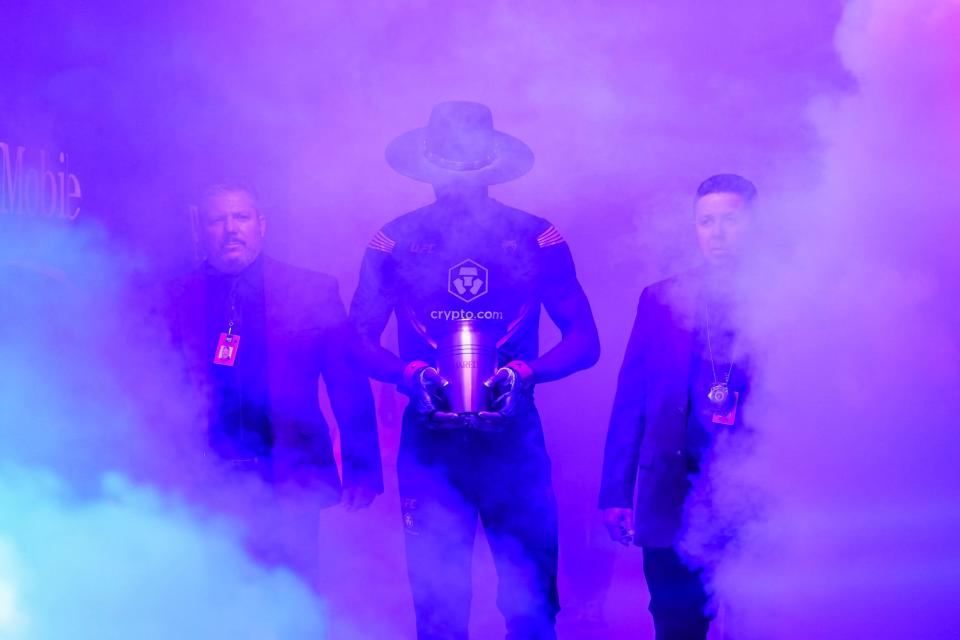 Israel Adesanya walks out at UFC 276.