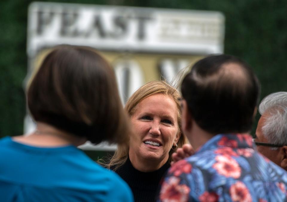 Stockton vice mayor Christina Fugazi talks with people at the Feast at the Fox event held on May 6, 2022 at the Bob Hope (Fox) Theatre in downtown Stockton. The event, which featured a 7-course meal for 160 people from locally sourced ingredients prepared by local chefs, raised funds for the Delta culinary program.