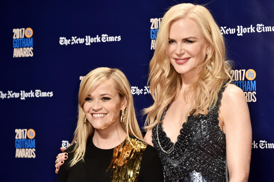 Reese and Nicole smiling together at a media event