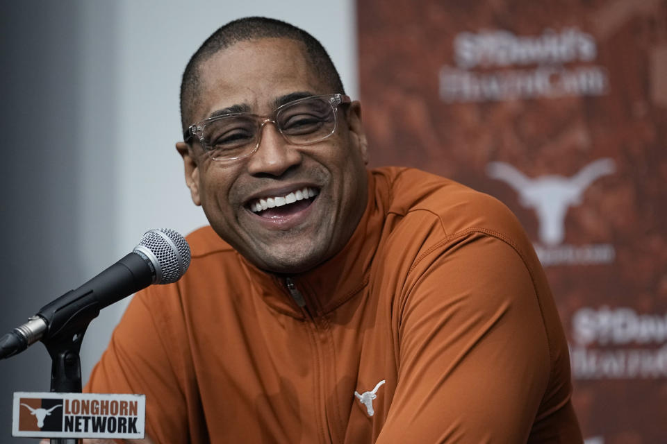 Texas Longhorns NCAA college basketball acting head coach Rodney Terry jokes during a news conference in Austin, Texas, Monday, Jan. 9, 2023. (AP Photo/Eric Gay)