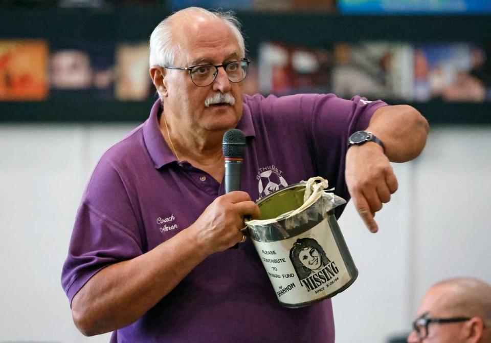 Angel Menendez, a former coach and teacher of student Shannon Melendi, holds a paint can that was used to collect reward money after the disappearance of Melendi in 1994 before the arrest of Colvin “Butch” Hinton years later. Menendez was speaking to seniors assembled during the Shannon Melendi 30th Commemorative Senior Safety Assembly Sponsored by the Shannon Melendi 30th Commemorative Committee at Southwest Miami Senior High School in Miami, Florida on Tuesday, March 19, 2024. Shannon Melendi was a 1992 Honors Graduate from Southwest Miami Senior High School, attending college at Emory University in Atlanta, Georgia. On March 26, 1994, while on a break from work, Shannon was kidnapped, raped, and murdered by Colvin “Butch” Hinton. Hinton was convicted and sentenced to life in prison in 2005, with the possibility of parole. He is again eligible for parole in January, 2025.