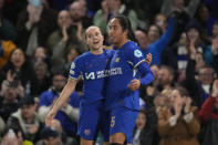 Chelsea's Mayra Ramirez, right, celebrates after scores her side's first goal during the Women's Champions League quarterfinal second leg soccer match between Chelsea and Ajax at Stamford Bridge Stadium in London, Wednesday, March 27, 2024. (AP Photo/Kirsty Wigglesworth)