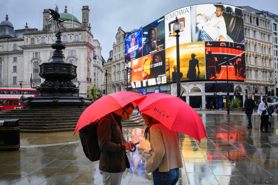 People with umbrellas in the wet weather in Piccadilly Circus, London. The threat of flooding remains high in the south of England as the UK feels the after-effects of the devastating Storm Ciaran, and the extreme weather looks set to bring downpours and strong winds to Scotland and parts of northern England. Picture date: Saturday November 4, 2023. (Photo by Matt Crossick/PA Images via Getty Images)