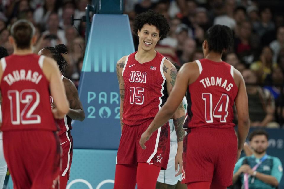 American Brittney Griner (15) smiles after the U.S. scored against Nigeria during an Olympic quarterfinal game