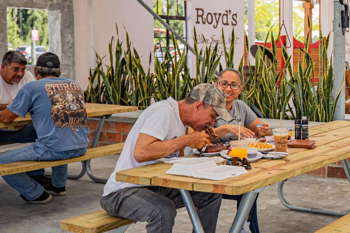 Customers eat Cuban food at Royd’s.