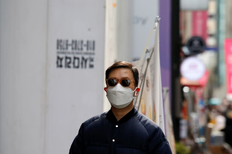 A man wears a mask to prevent contracting coronavirus in Seoul