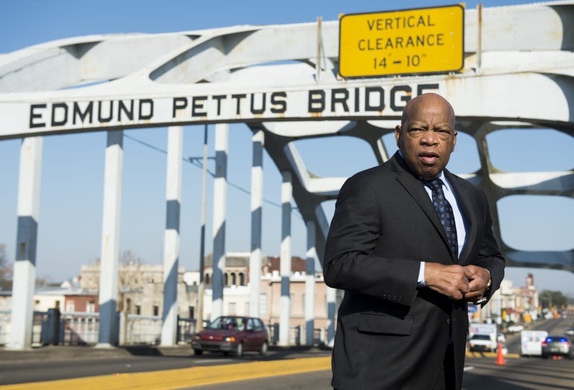 Rep. John Lewis, D-Ga., stands on the Edmund Pettus Bridge in Selma, Ala., in between television interviews on Feb. 14, 2015. Rep. Lewis was beaten by police on the bridge on “Bloody Sunday” 50 years ago on March 7, 1965, during an attempted march for voting rights from Selma to Montgomery. (Photo By Bill Clark/CQ Roll Call)