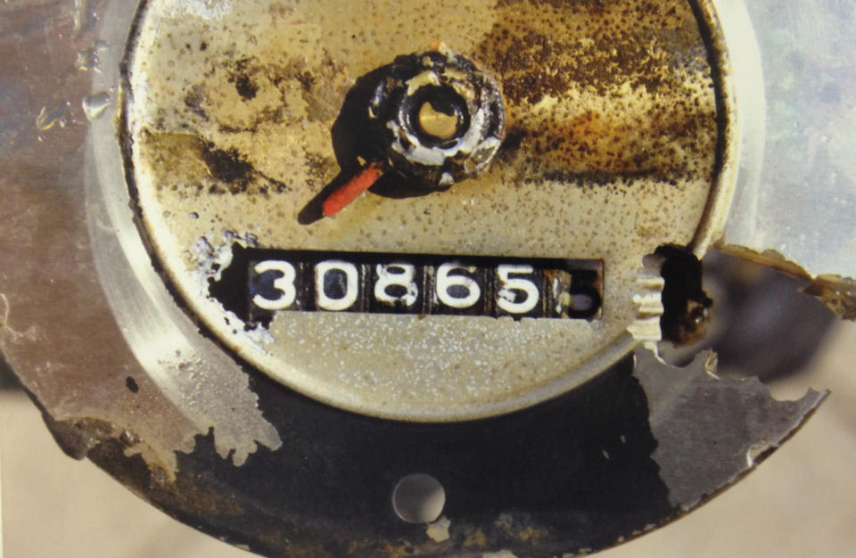 In this undated photo provided by the South Dakota Attorney Generals Office, the odometer mileage reading of the 1960 Studebaker unearthed in September, 2013, is seen. Two South Dakota girls on their way to an end-of-school-year party at a gravel pit in May 1971 drove off a country road into a creek and remained hidden until last fall when a drought brought their car into view, authorities said Tuesday, April 15, 2014. State and local officials held a news conference Tuesday afternoon confirming that the 1960 Studebaker unearthed in September included the remains of Cheryl Miller and Pamella Jackson, both 17-year-olds who attended Vermillion High School. (AP Photo/South Dakota Attorney Generals Office)