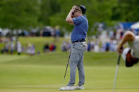 Ryan Brehm reacts as his putt just misses on the 18th hole during the third round of the PGA Zurich Classic golf tournament at TPC Louisiana in Avondale, La., Saturday, April 27, 2024. Brehm and Mark Hubbard are tied for third after the round. (AP Photo/Matthew Hinton)