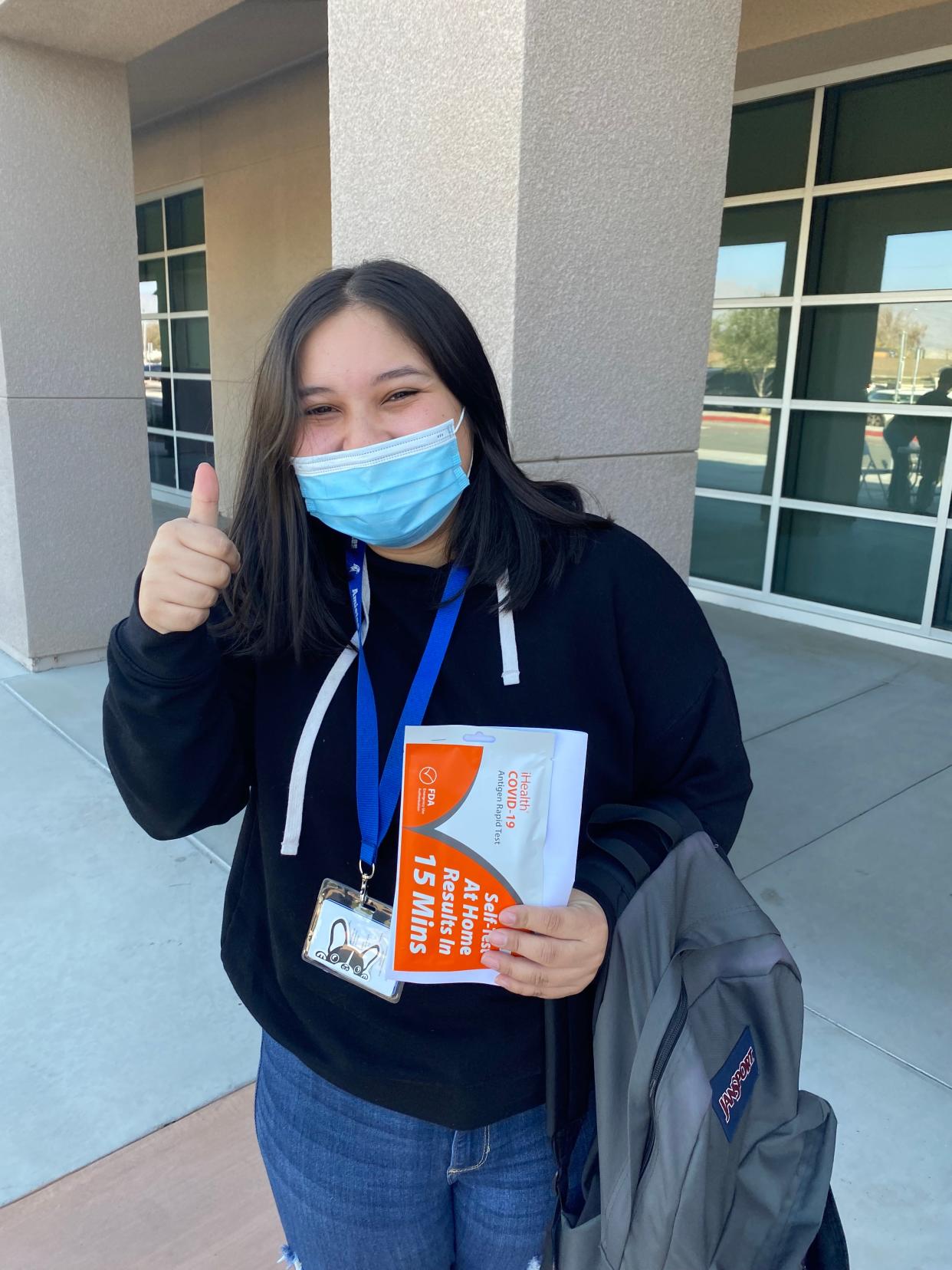 An Amistad High School 11th grader Tanya takes home her rapid antigen test.